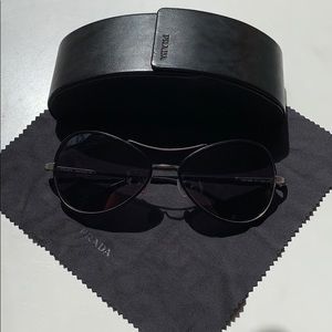 Vintage Prada sunglasses, leather trim, never worn